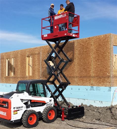 can a skid steer pick up a car|skid steer lift height.